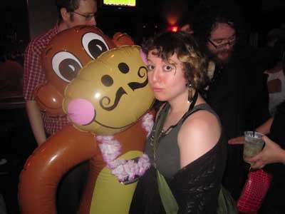 Boston's finest were on hand for this special evening. jojo the Burlesque Poetess (of the Army of Broken Toys) poses with Walter's monkey. Ok, that sounds kinda dirty.